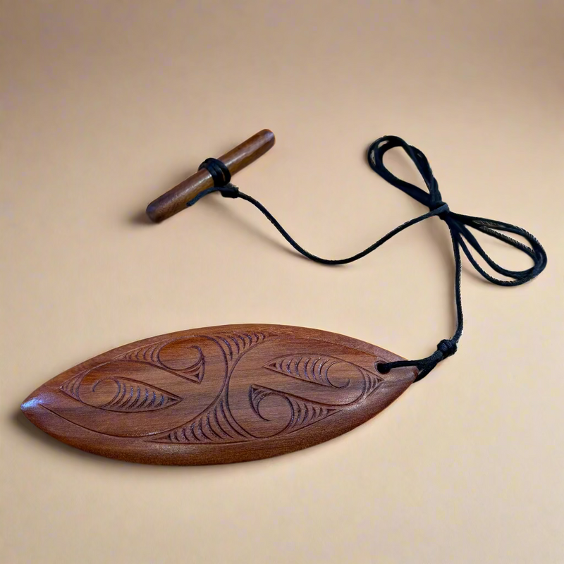 Pūrerehua (Toggle) - Nā James Davidson of Carve It